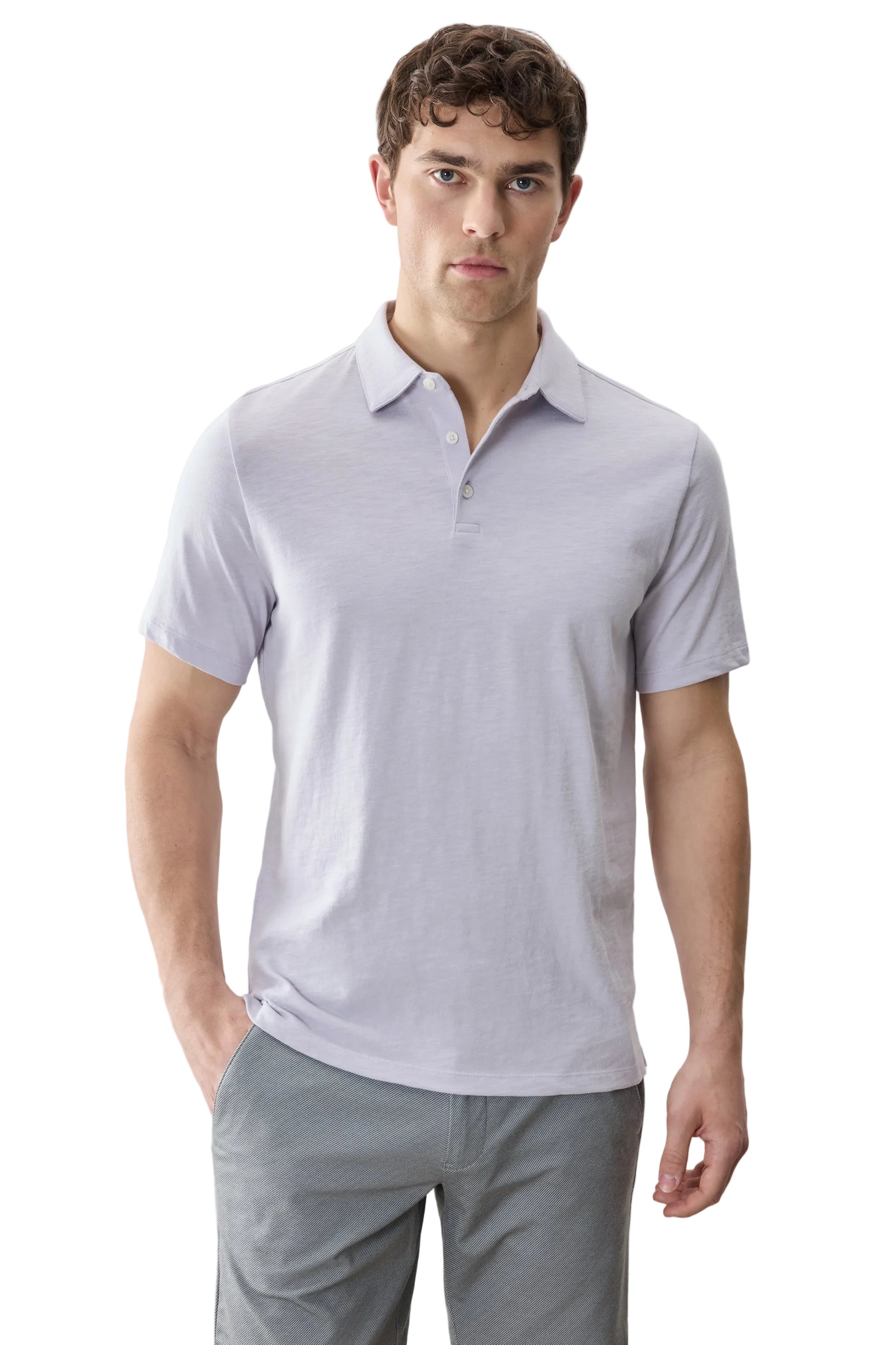 Man wearing a light gray polo shirt and pants on a plain background