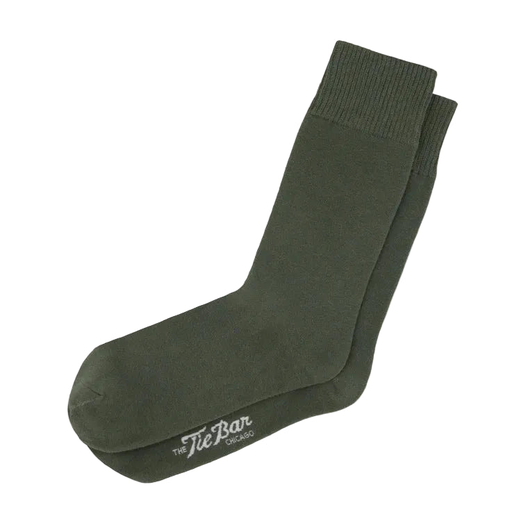 Green sock with 'The Tie Bar' logo on a white background