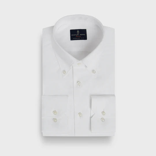 White dress shirt with a collar label on a light gray background